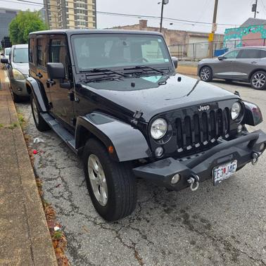 Black 2015 Jeep Wrangler Unlimited Sahara