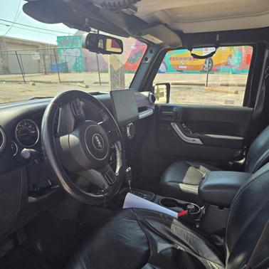 Black 2015 Jeep Wrangler Unlimited Sahara