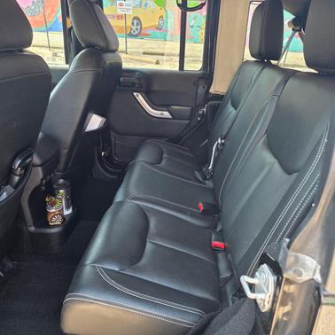 Black 2015 Jeep Wrangler Unlimited Sahara