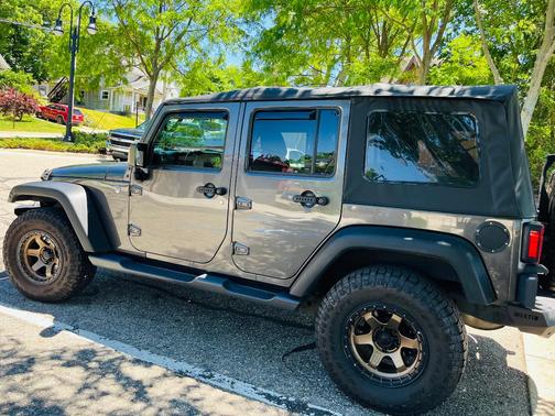 Gray 2016 Jeep Wrangler Unlimited Sport