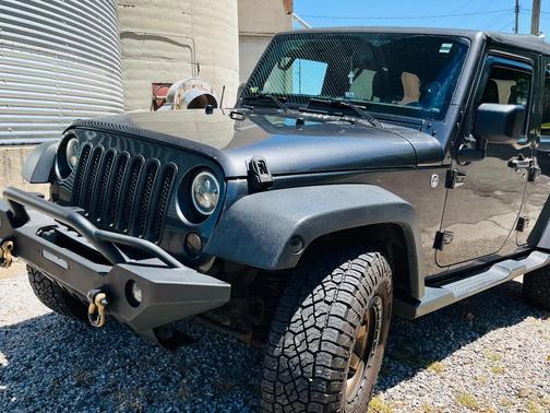 Gray 2016 Jeep Wrangler Unlimited Sport
