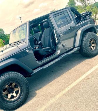 Gray 2016 Jeep Wrangler Unlimited Sport