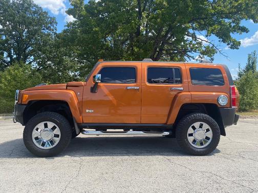 Orange 2007 Hummer H3 Base