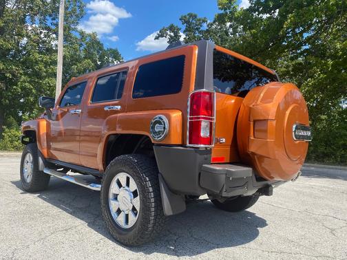 Orange 2007 Hummer H3 Base