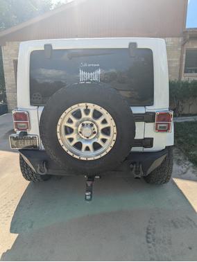 White 2016 Jeep Wrangler Unlimited Sahara