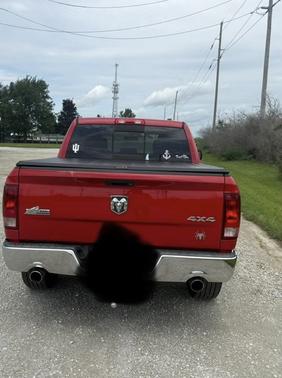 Red 2011 Dodge Ram 1500 SLT