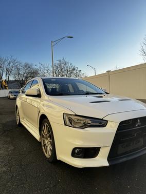 White 2014 Mitsubishi Lancer Evolution GSR