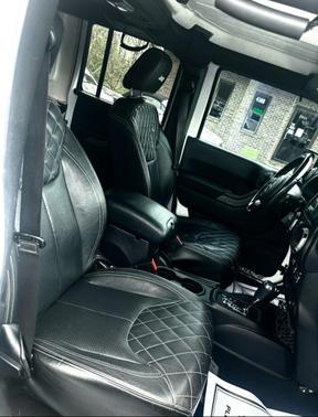White 2015 Jeep Wrangler Unlimited Sport