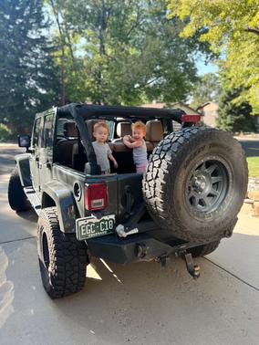 Green 2015 Jeep Wrangler Unlimited Sahara