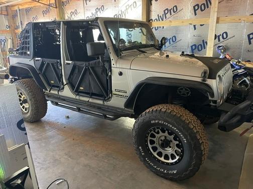 Silver 2012 Jeep Wrangler Unlimited Sport