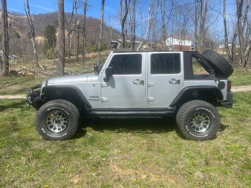 Silver 2012 Jeep Wrangler Unlimited Sport