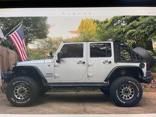 Silver 2012 Jeep Wrangler Unlimited Sport