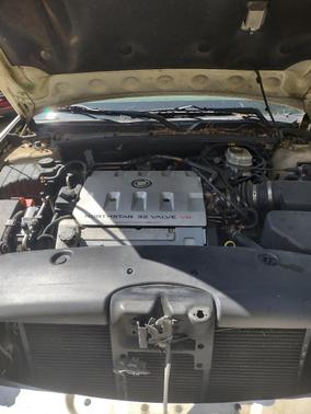 White 2002 Cadillac DeVille Base