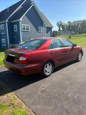 Red 2002 Toyota Camry SE