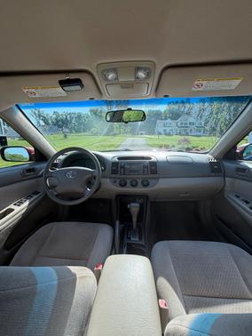 Red 2002 Toyota Camry SE