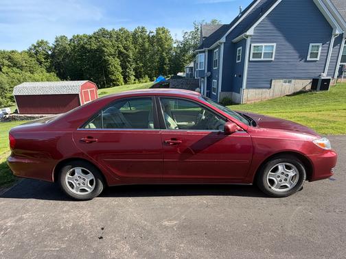 Red 2002 Toyota Camry SE