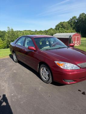 Red 2002 Toyota Camry SE