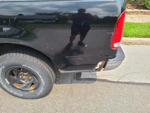 Black 1997 Ford F-150 XLT