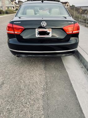 Photo 5 of 12 of 2014 Volkswagen Passat 2.0L DSG TDI SE w/Sunroof & Nav