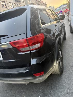 Black 2011 Jeep Grand Cherokee Laredo