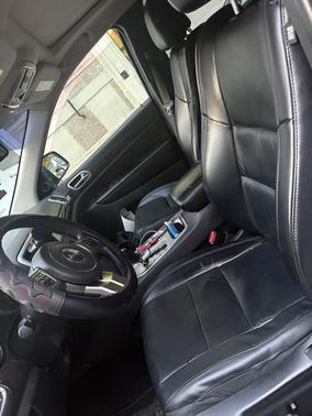 Black 2011 Jeep Grand Cherokee Laredo
