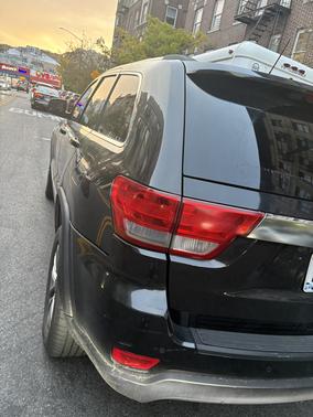 Black 2011 Jeep Grand Cherokee Laredo