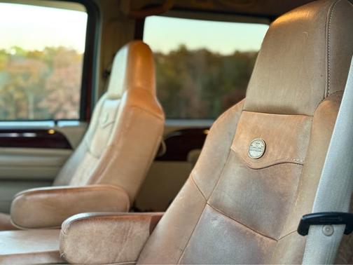Orange 2005 Ford F-350 Lariat Crew Cab Super Duty DRW