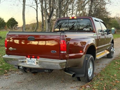 Orange 2005 Ford F-350 Lariat Crew Cab Super Duty DRW