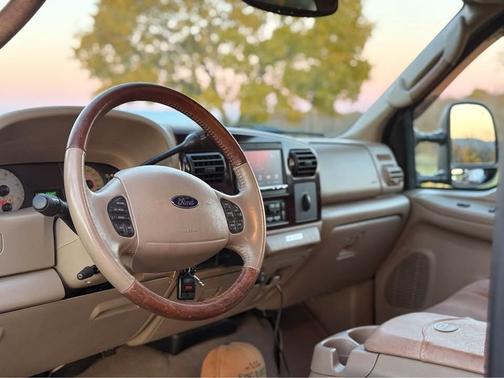 Orange 2005 Ford F-350 Lariat Crew Cab Super Duty DRW