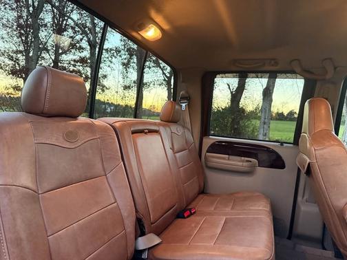 Orange 2005 Ford F-350 Lariat Crew Cab Super Duty DRW