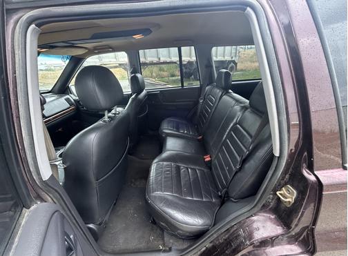 Purple 1997 Jeep Grand Cherokee Laredo 4WD