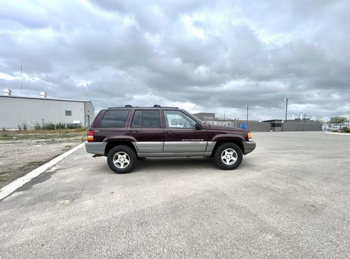 Purple 1997 Jeep Grand Cherokee Laredo 4WD