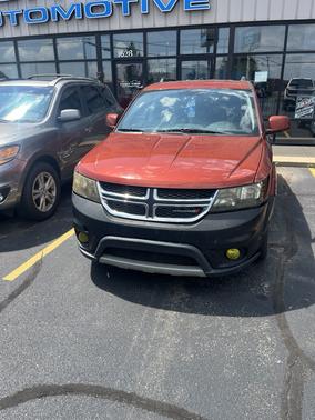 Orange 2014 Dodge Journey SXT