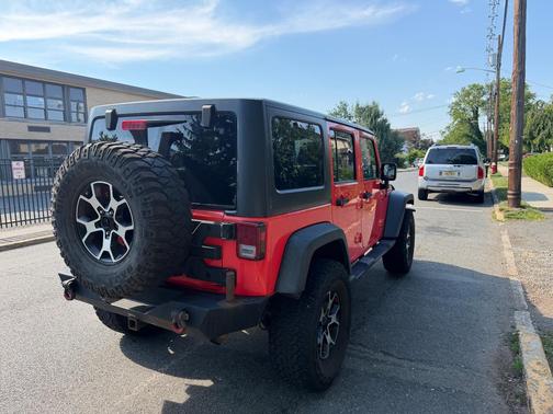 Red 2013 Jeep Wrangler Unlimited Rubicon