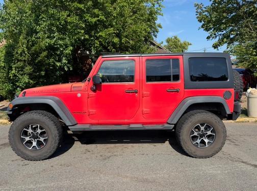 Red 2013 Jeep Wrangler Unlimited Rubicon