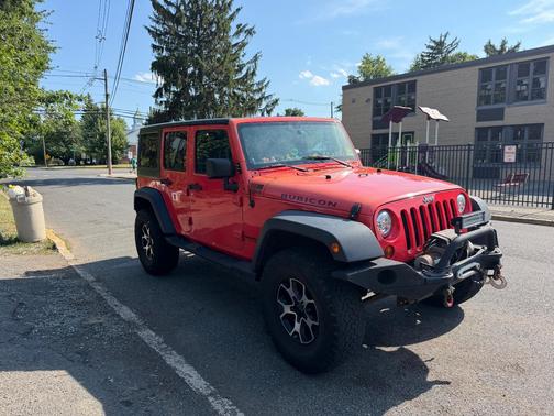 Red 2013 Jeep Wrangler Unlimited Rubicon