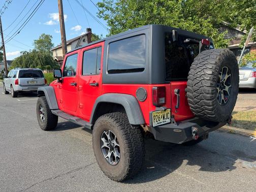 Red 2013 Jeep Wrangler Unlimited Rubicon