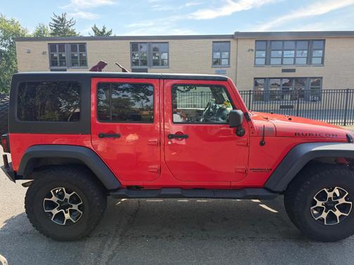 Red 2013 Jeep Wrangler Unlimited Rubicon