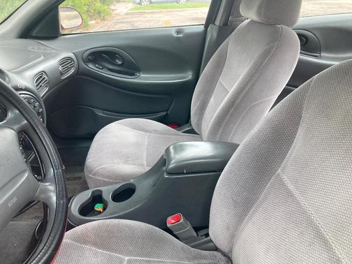 Red 1999 Ford Taurus SE