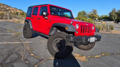 Red 2016 Jeep Wrangler Unlimited Sport