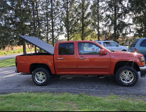 Orange 2010 GMC Canyon SLT