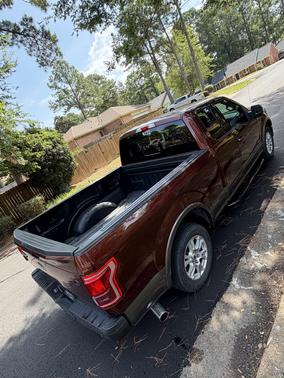 Red 2016 Ford F-150 Lariat