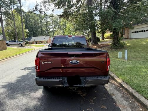 Red 2016 Ford F-150 Lariat