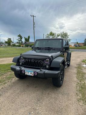 Black 2016 Jeep Wrangler Unlimited Sport