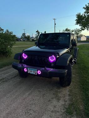 Black 2016 Jeep Wrangler Unlimited Sport