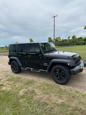 Black 2016 Jeep Wrangler Unlimited Sport