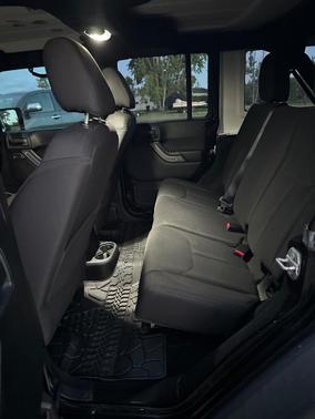 Black 2016 Jeep Wrangler Unlimited Sport
