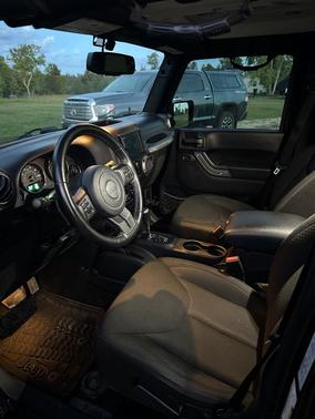 Black 2016 Jeep Wrangler Unlimited Sport