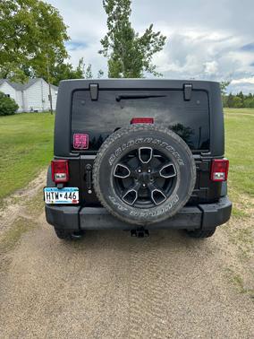 Black 2016 Jeep Wrangler Unlimited Sport