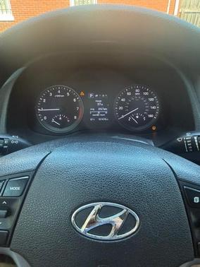 Orange 2017 Hyundai TUCSON SE